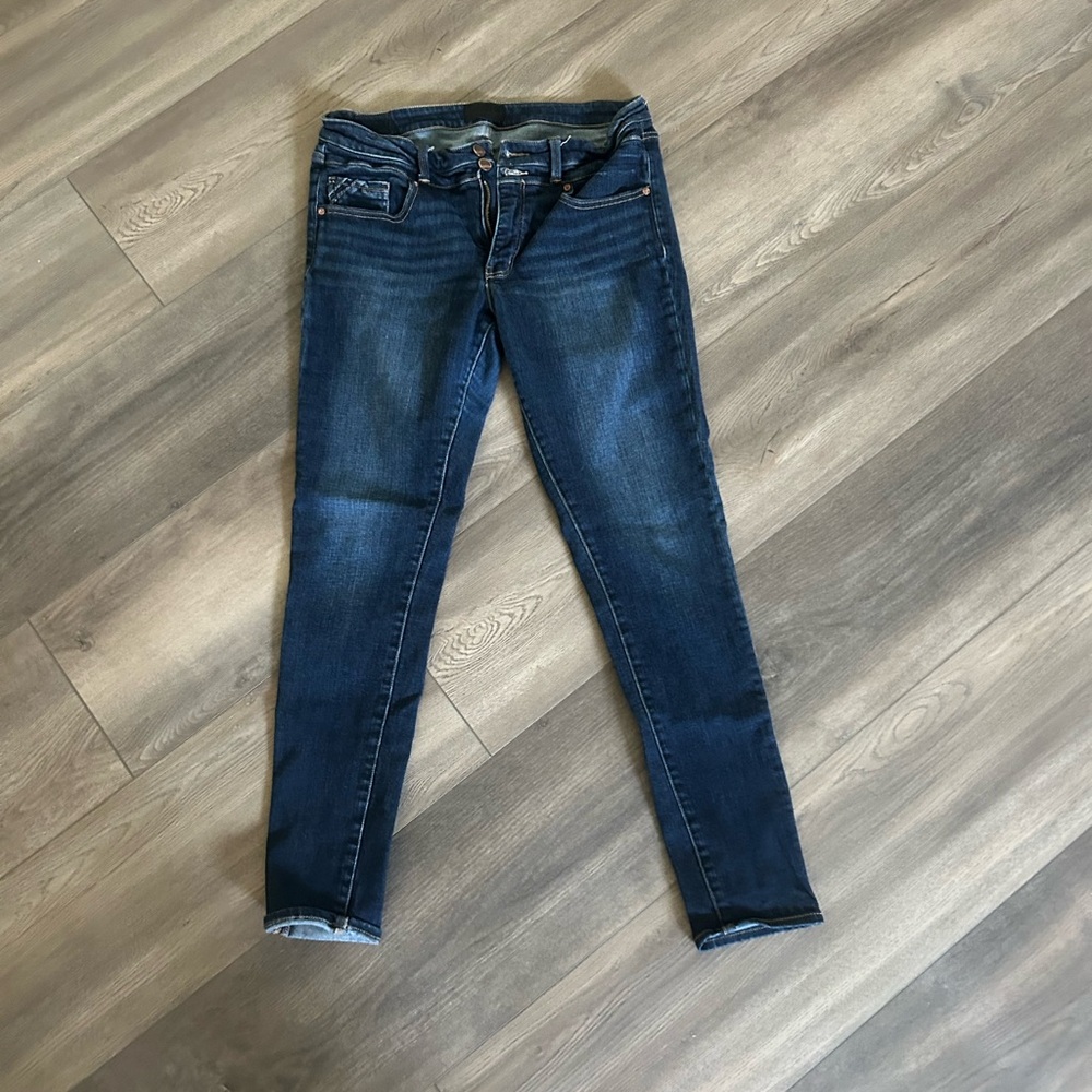 Dark wash buckle jeans